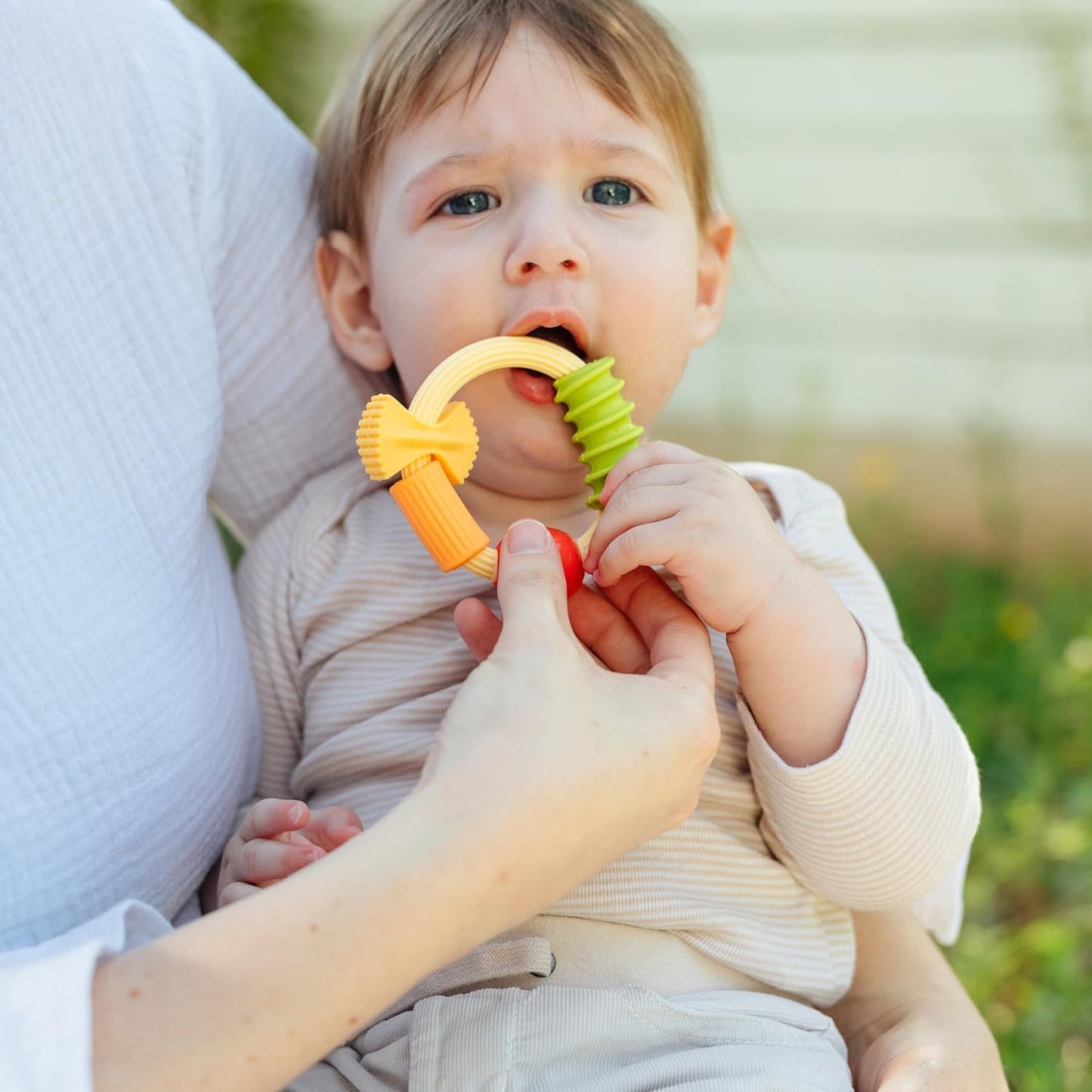Nuby Silicone Carrot Tube Teether - Baby Teething Toy - Massaging Bristles for Sore Gums - 3+ Months